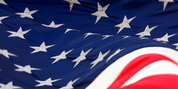 Photo of an American flag in the sky