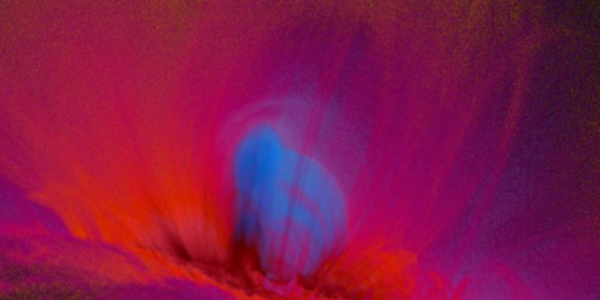 Purple, red, and blue striations show flux ropes on the Sun.