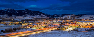 Town of Bozeman, MT just before sunrise covered in snow.