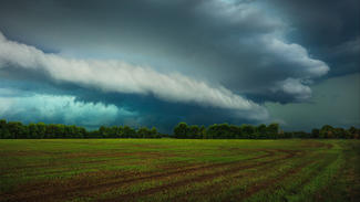 Assessing the U.S. Climate in June 2024 A storm approaching an open field in the summer.