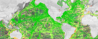 Mercator projection of the world with green, yellow, and red track lines crossing bodies of water across the globe showing the location of bathymetric data held by the Data Center for Digital Bathymetry. Mercator projection of the world with green, yellow, and red track lines crossing bodies of water across the globe showing the location of bathymetric data held by the Data Center for Digital Bathymetry.