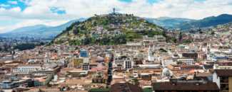 Quito, Ecuador Green mountains overlook the buildings of Quito, Ecuador.