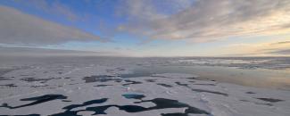 Photo of an Arctic landscape of ice floes and melt pools Photo of an Arctic landscape of ice floes and melt pools
