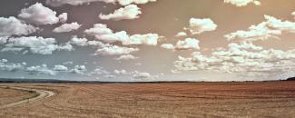 Photo of a cloudy sky over a field Photo of a cloudy sky over a field