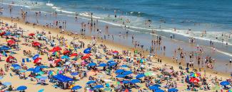 Photo of a crowded beach covered with umbrellas in Ocean City, Maryland, courtesy of iStock Photo of a crowded beach covered with umbrellas in Ocean City, Maryland, courtesy of iStock