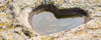 Photo of a heart carved into rock courtesy of iStock Photo of a heart carved into rock courtesy of iStock