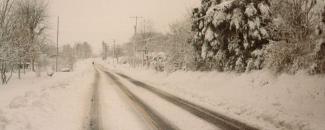 Photo of snow accumulation on a road in western North Carolina in March 1993 courtesy of the National Weather Service Photo of snow accumulation on a road in western North Carolina in March 1993 courtesy of the National Weather Service
