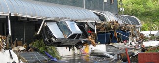 Cars thrown into building by Samoa Islands tsunami Cars thrown into building by Samoa Islands tsunami