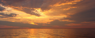 Photo of golden sunset over Atlantic Ocean Photo of golden sunset over Atlantic Ocean