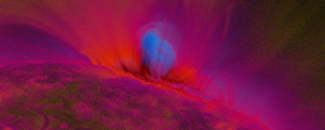 Purple, red, and blue striations show flux ropes on the Sun. Purple, red, and blue striations show flux ropes on the Sun.