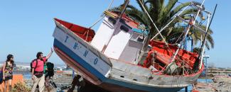 Photo of a boat washed ashore during Maule Chile 2010 tsunami Photo of a boat washed ashore during Maule Chile 2010 tsunami