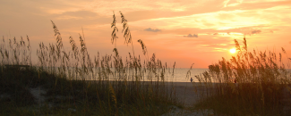 Photo of a sunrise over Tybee Island in Georgia Photo of a sunrise over Tybee Island in Georgia